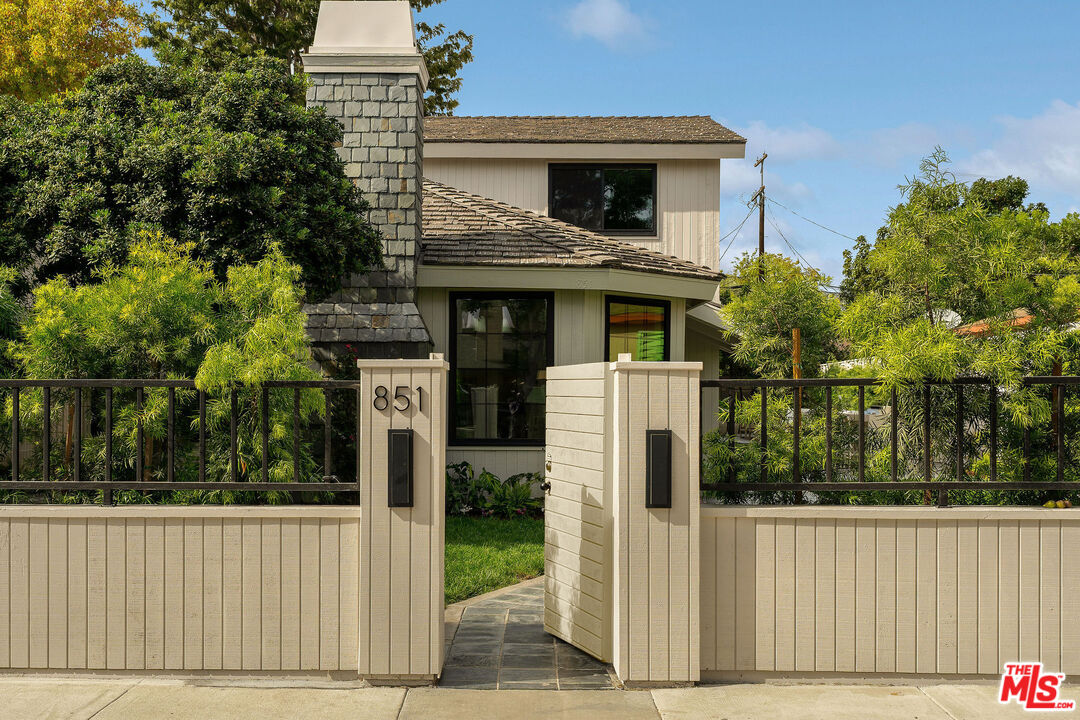 851 Dickson Street Marina del Rey, CA 90292 - Photo 38 of 39 a front view of a house with garden