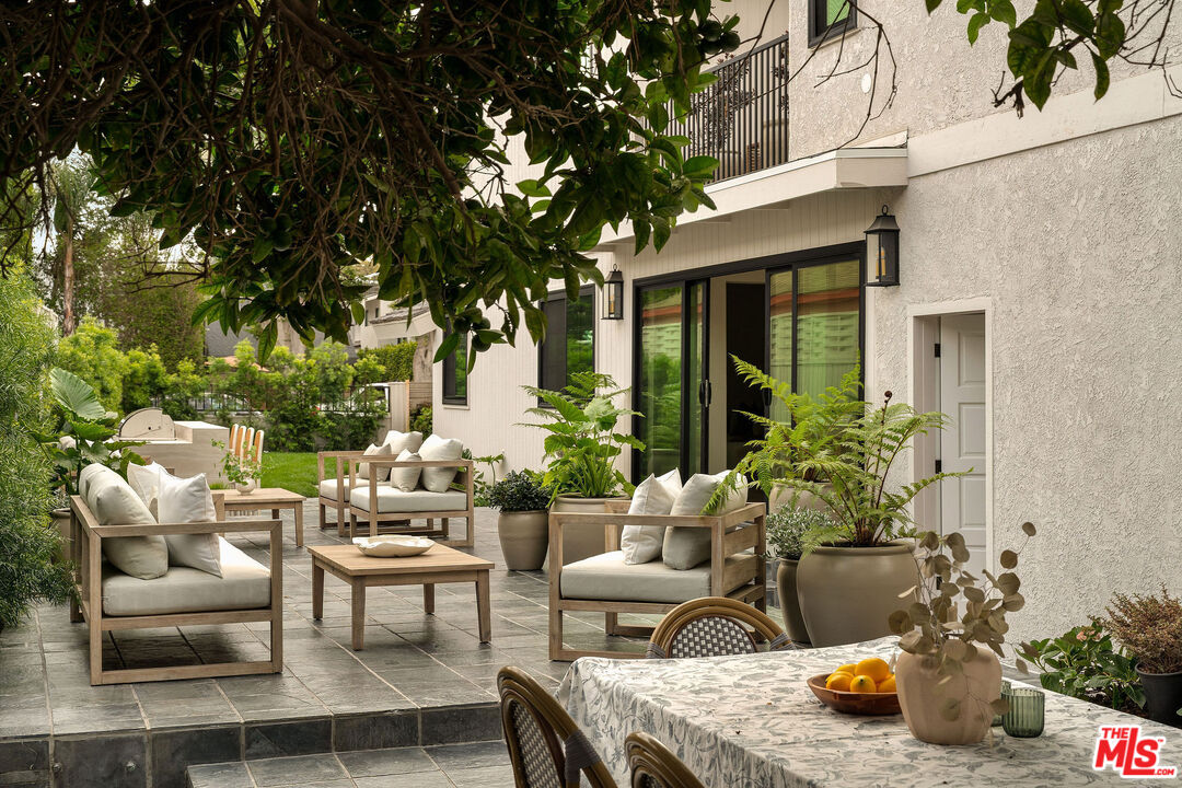 851 Dickson Street Marina del Rey, CA 90292 - Photo 4 of 39 a view of a patio with couches and potted plants