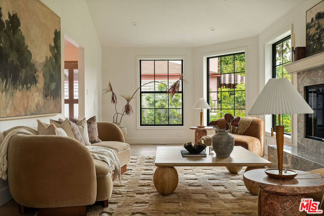 851 Dickson Street Marina del Rey, CA 90292 - Photo 6 of 39 a living room with furniture and a fireplace