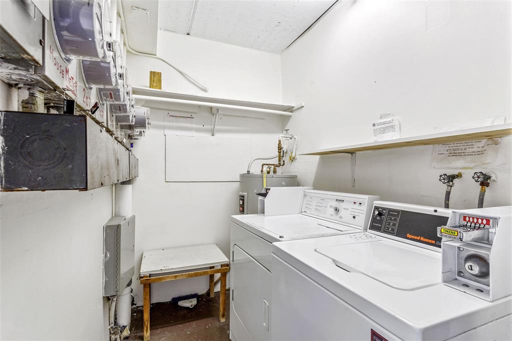 4832 Jasper Drive, Unit 107 New Port Richey, FL 34652 - Photo 16 of 27 a utility room with dryer and washer
