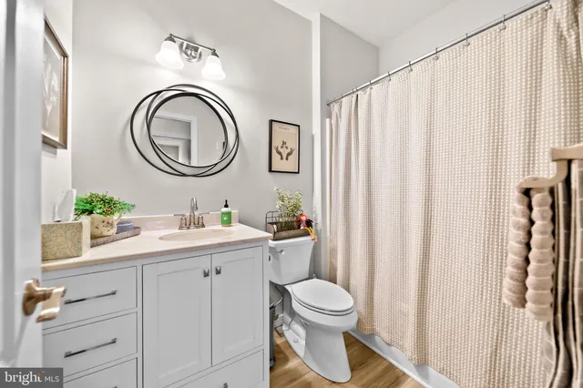 a living room with lots of furniture and a flat screen tv