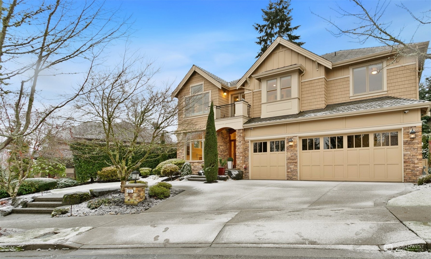 573 Saddleback Loop Way Northwest Issaquah, WA 98027 - Photo 1 of 40 a view of a big house with many windows