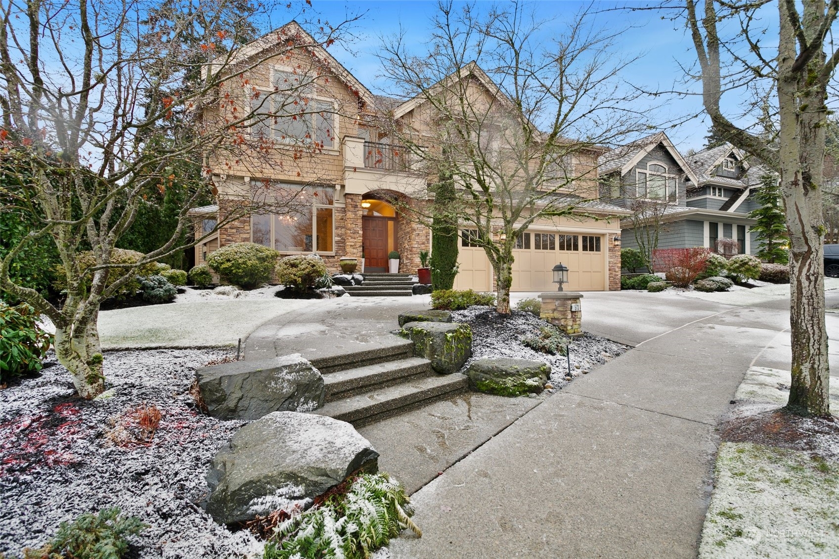 573 Saddleback Loop Way Northwest Issaquah, WA 98027 - Photo 2 of 40 a row of houses with outdoor seating