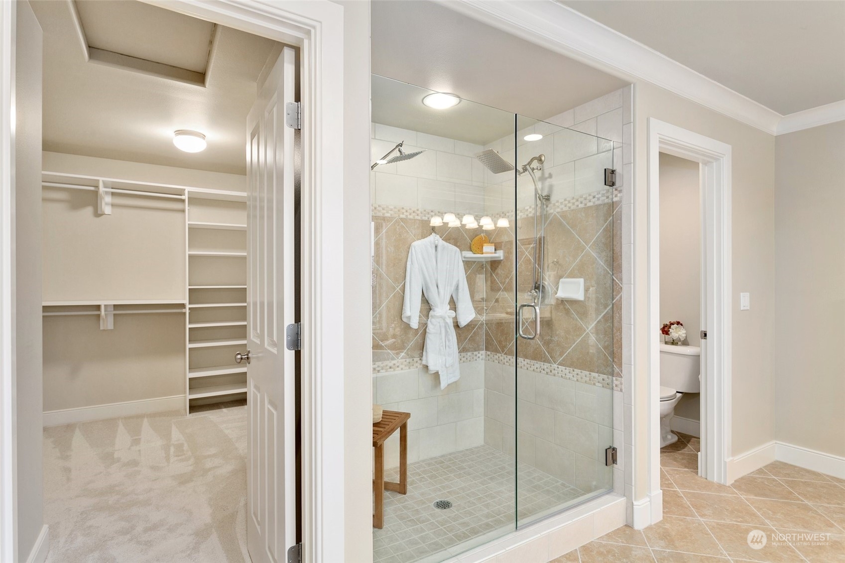 573 Saddleback Loop Way Northwest Issaquah, WA 98027 - Photo 23 of 40 a bathroom with a shower and a sink