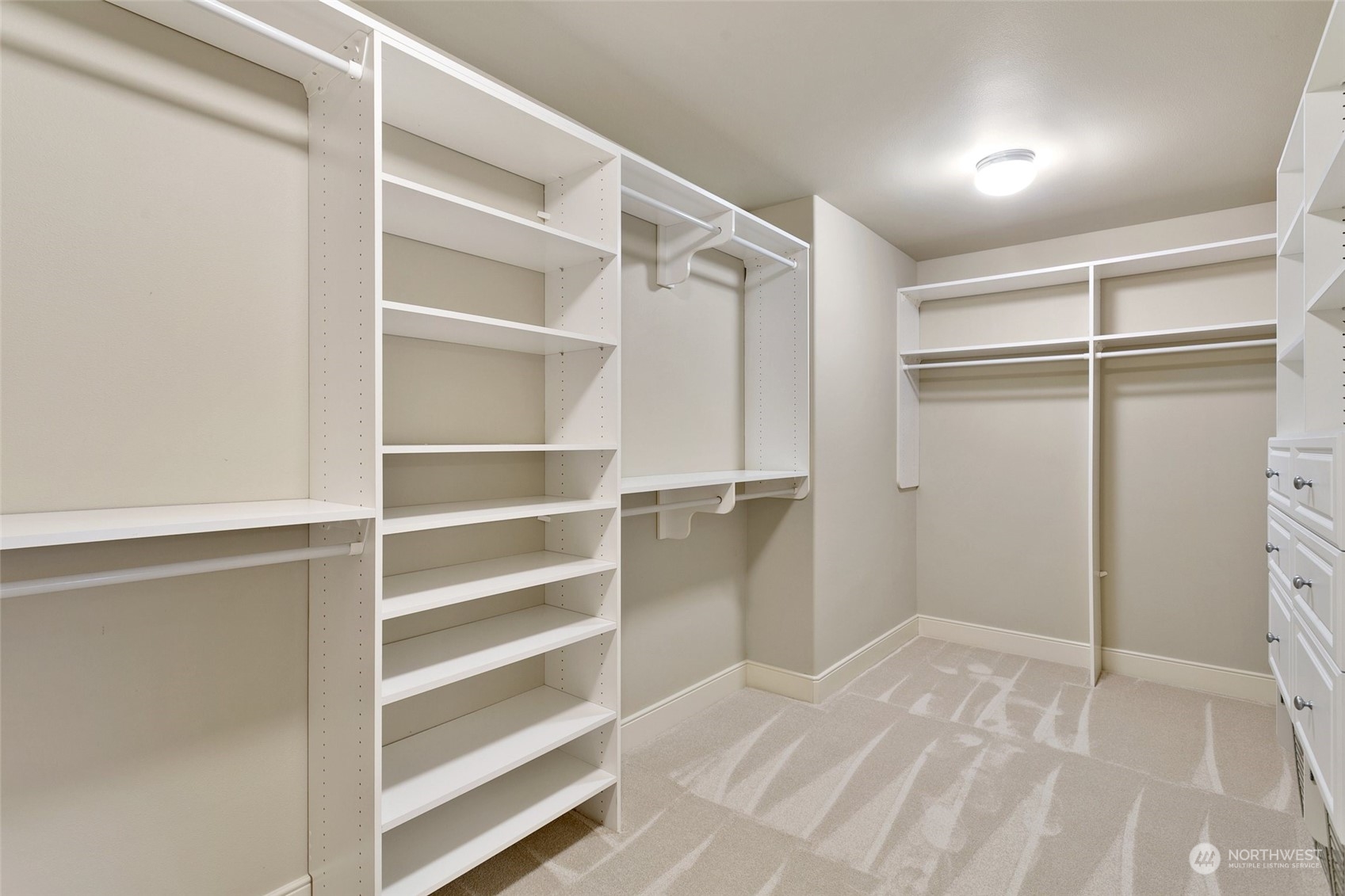 573 Saddleback Loop Way Northwest Issaquah, WA 98027 - Photo 24 of 40 a view of an empty walk in closet
