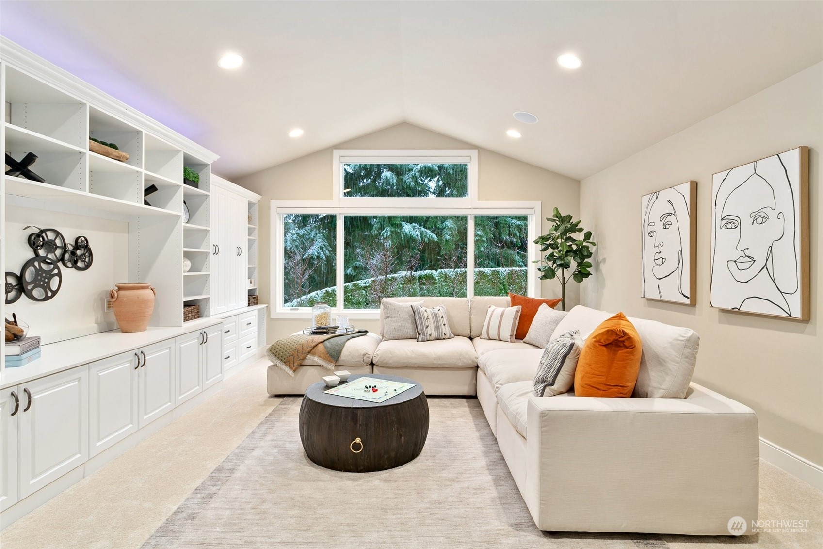 573 Saddleback Loop Way Northwest Issaquah, WA 98027 - Photo 26 of 40 a living room with furniture and a large window