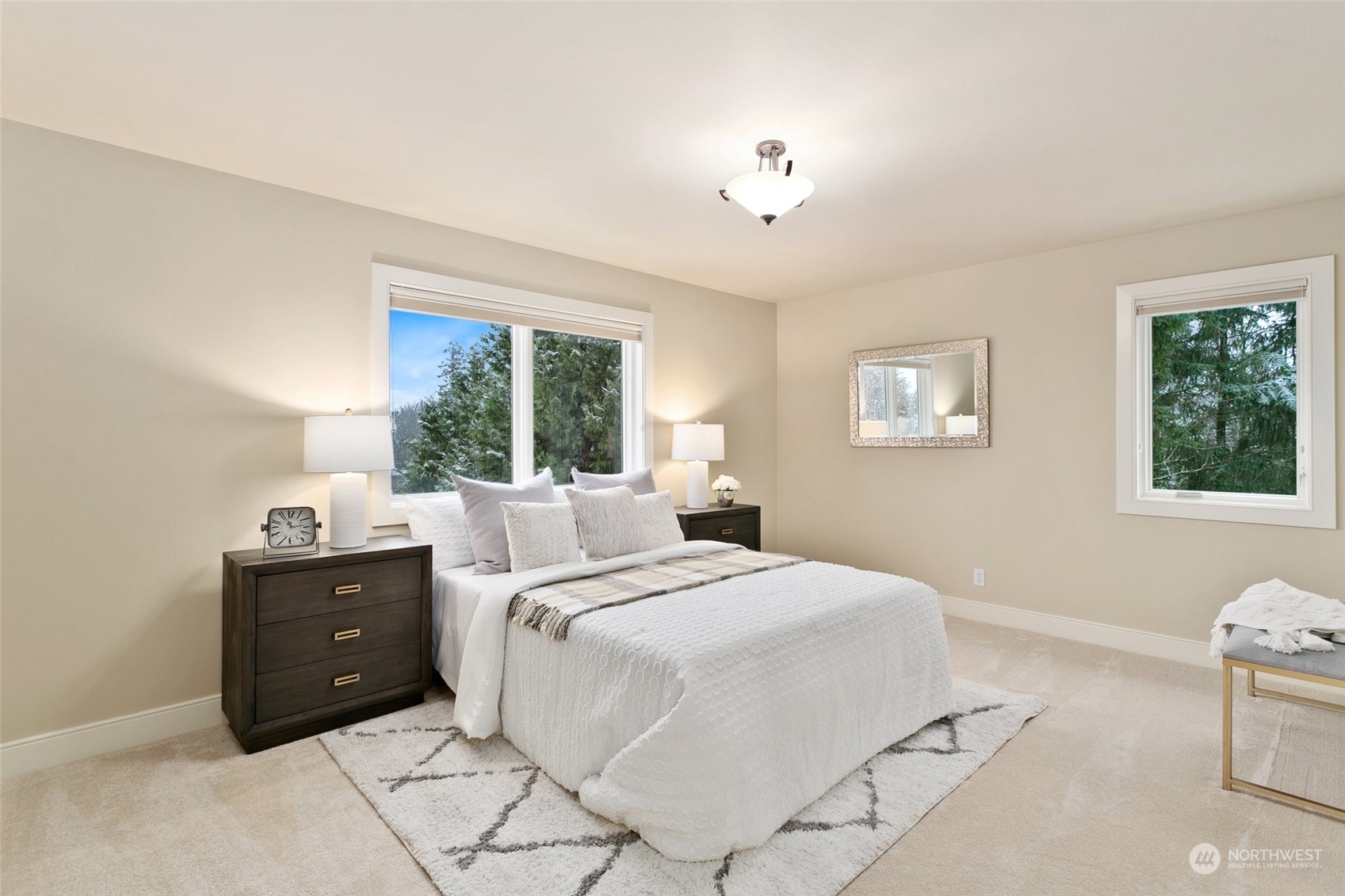 573 Saddleback Loop Way Northwest Issaquah, WA 98027 - Photo 27 of 40 a bedroom with a bed and a window