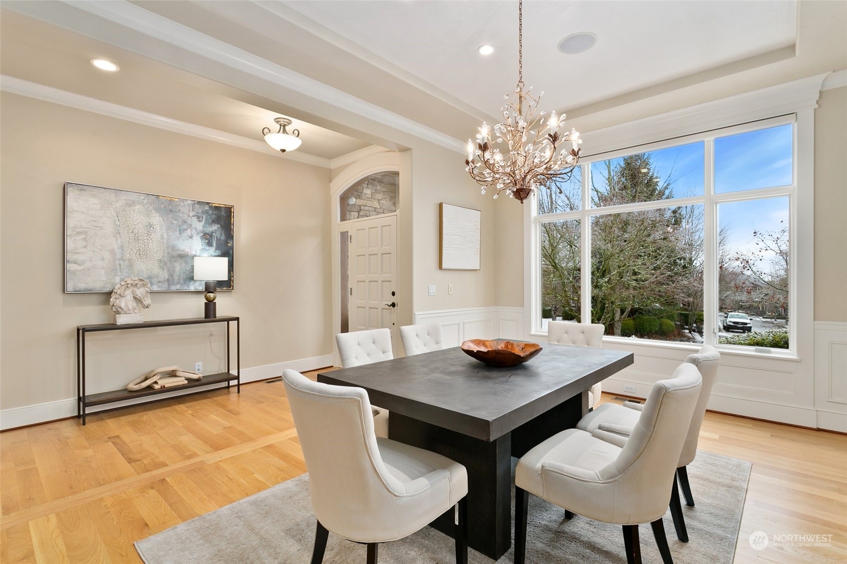 573 Saddleback Loop Way Northwest Issaquah, WA 98027 - Photo 3 of 40 a view of a dining room with furniture window and wooden floor
