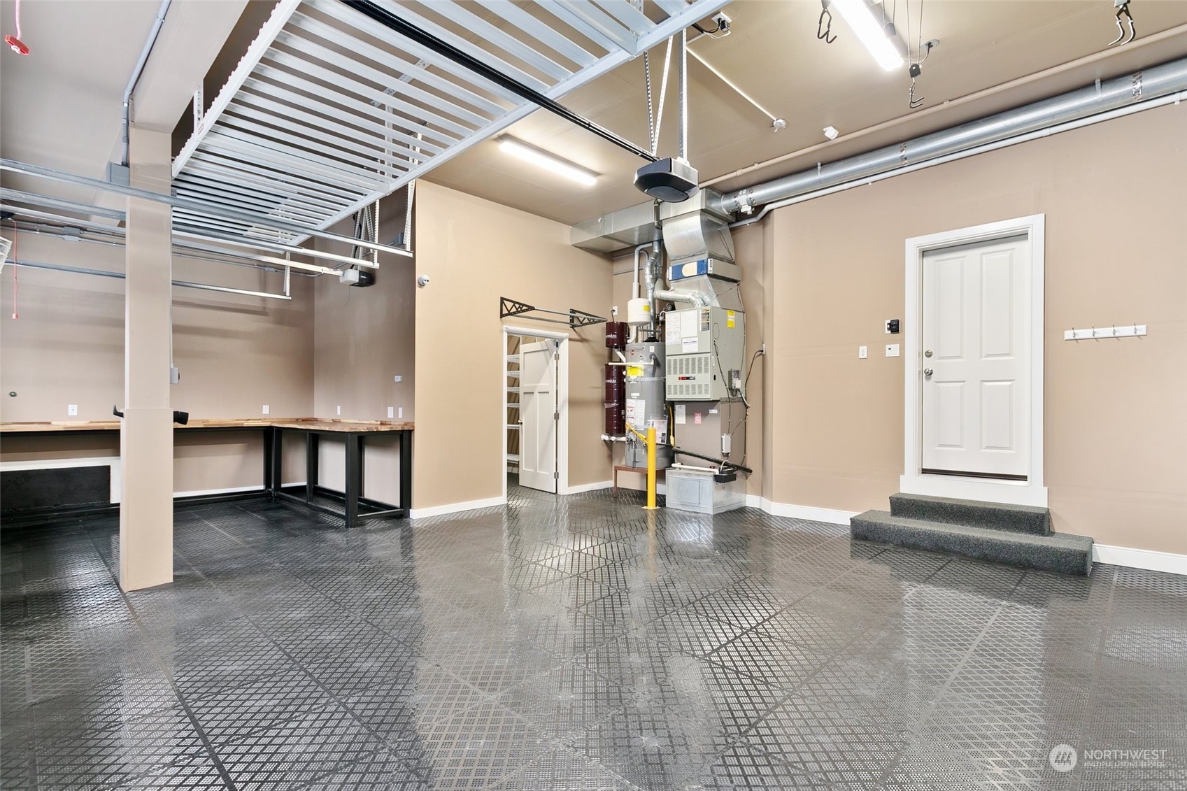 573 Saddleback Loop Way Northwest Issaquah, WA 98027 - Photo 38 of 40 an empty room with glass door and windows