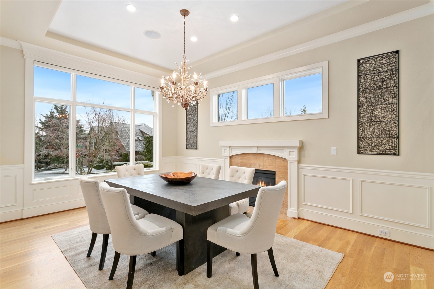 573 Saddleback Loop Way Northwest Issaquah, WA 98027 - Photo 4 of 40 a view of a dining room with furniture wooden floor and chandelier