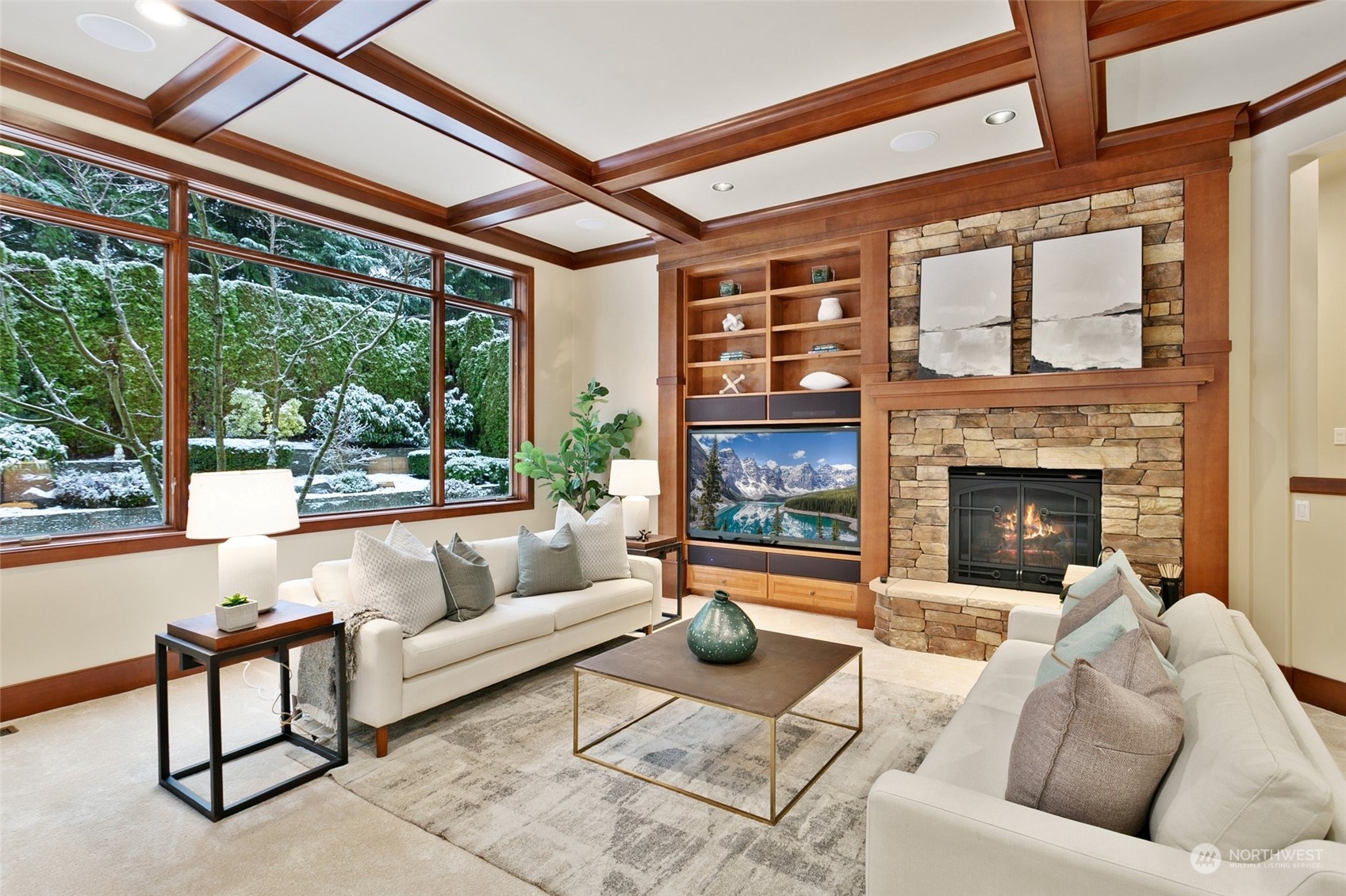 573 Saddleback Loop Way Northwest Issaquah, WA 98027 - Photo 5 of 40 a living room with furniture and a fireplace