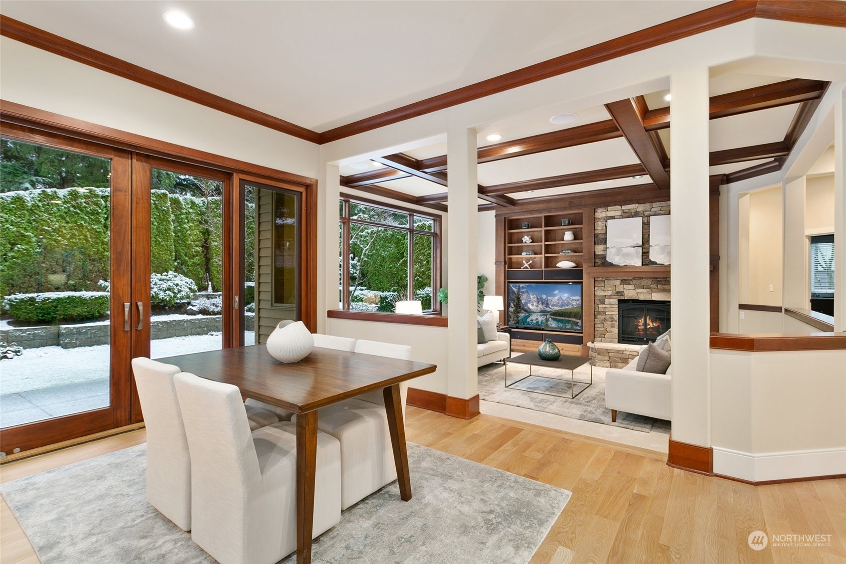 573 Saddleback Loop Way Northwest Issaquah, WA 98027 - Photo 7 of 40 a dining room with furniture and large windows