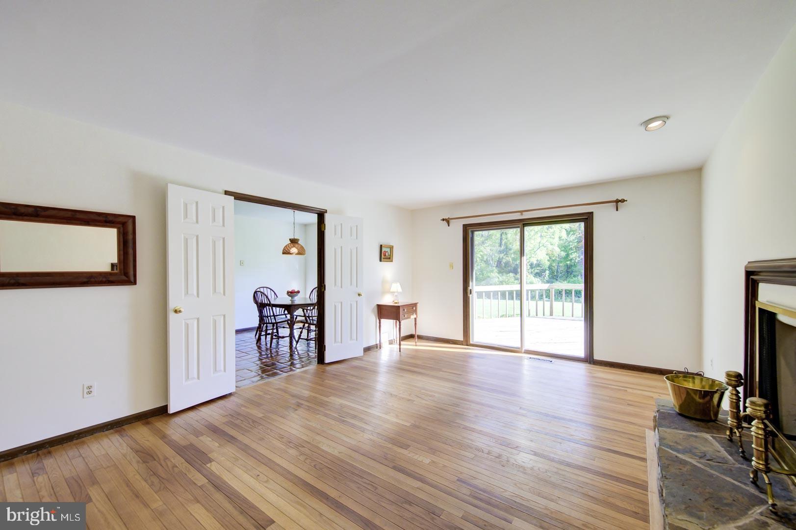 419 Waynesbrooke Road Berwyn, PA 19312 - Photo 16 of 32 Family room with sliding door to rear deck