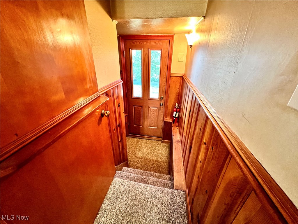 7220 Hemlock Road Independence, OH 44131 - Photo 37 of 48 Stairs to the back door and to the basement.