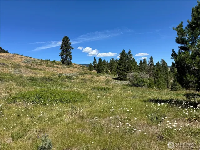 a view of a building in a field