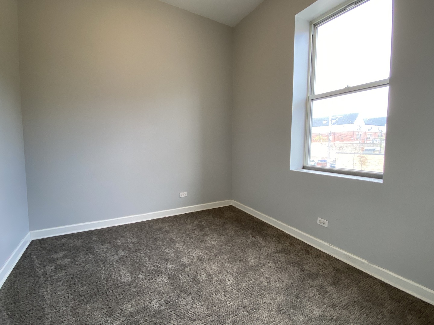 Undisclosed Address Chicago, IL 60622 - Photo 10 of 18 an empty room with a window