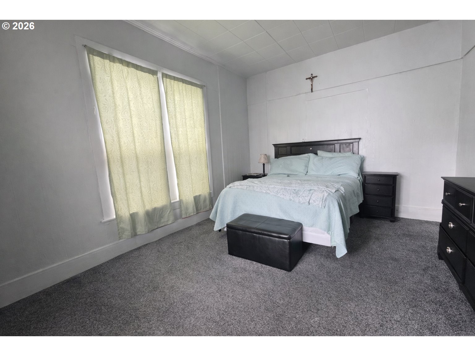 63563 Booth Lane La Grande, OR 97850 - Photo 15 of 24 a bedroom with a bed and a window