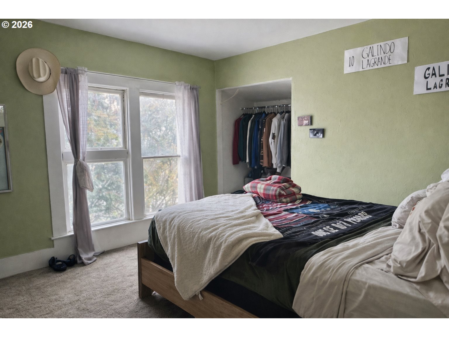 63563 Booth Lane La Grande, OR 97850 - Photo 17 of 24 a bedroom with a bed and a large window