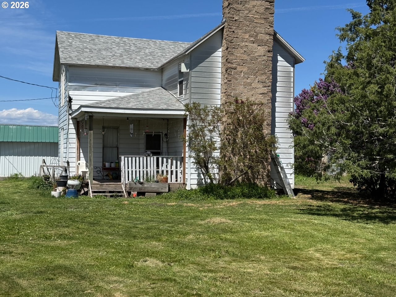 63563 Booth Lane La Grande, OR 97850 - Photo 10 of 24 a view of a house with a yard