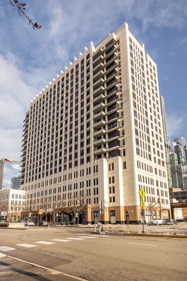 1255 South State Street, Unit 905 Chicago, IL 60605 - Photo 1 of 24 a front view of a building with a street