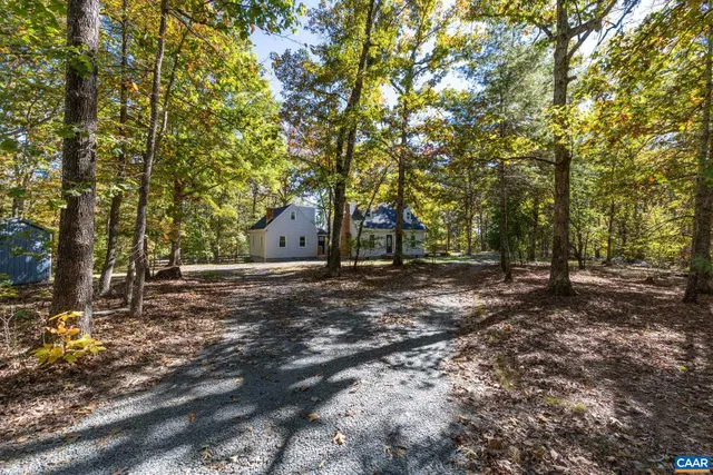 a view of a porch with wooden floor and stairs