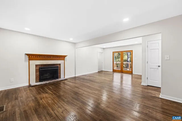 a kitchen with a refrigerator stove and microwave