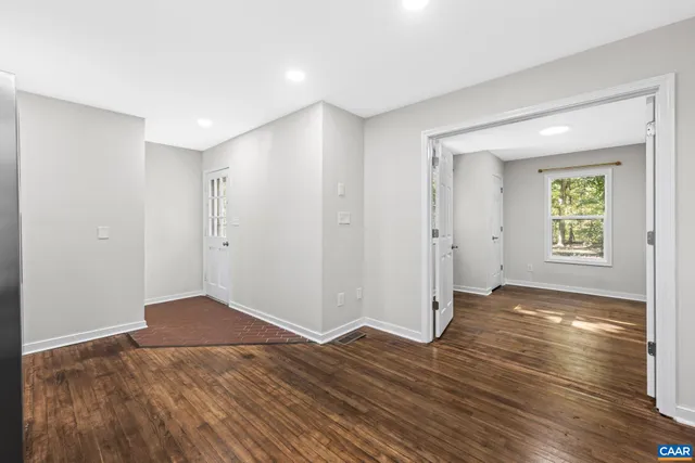 a view of an empty room and window