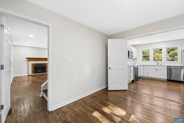 a view of entryway with wooden floor