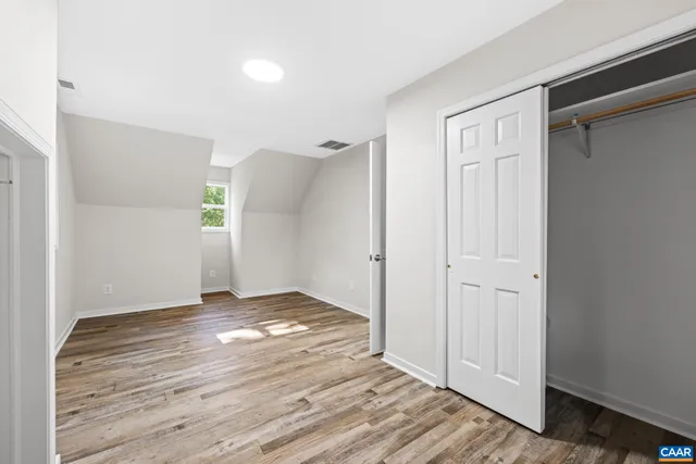 a kitchen with stainless steel appliances granite countertop a sink stove and microwave