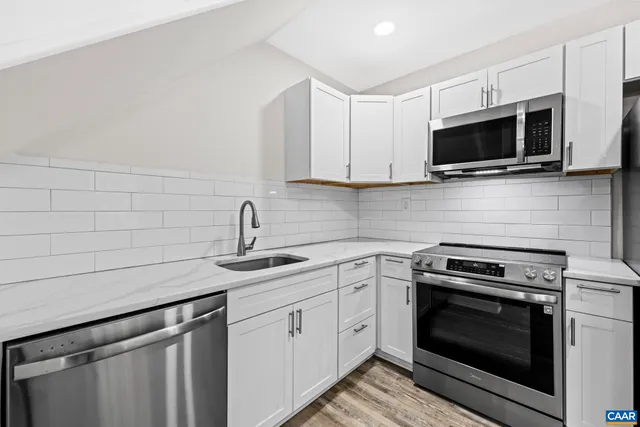 a view of a city with an ocean view