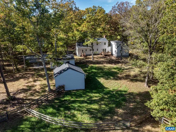 a house view with a backyard space