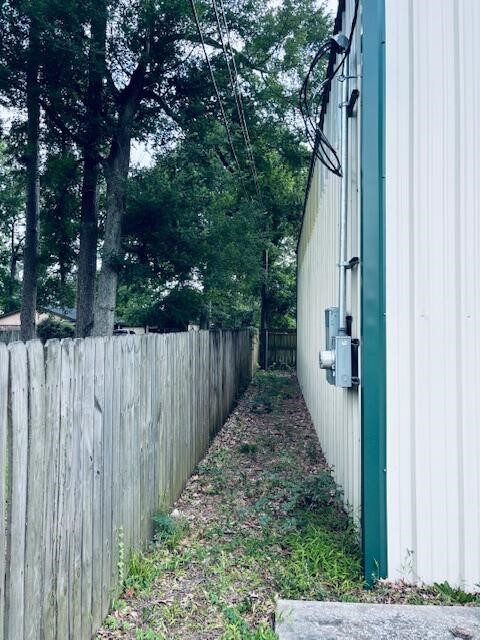 802 Fall Creek Drive Huffman, TX 77336 - Photo 14 of 17 a view of a backyard with pathway