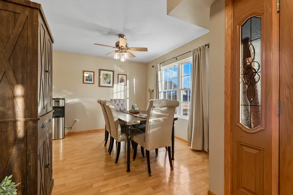 a view of a dining room with furniture and window