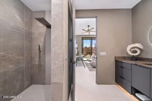 1313 Tortolita Mountain Circle Tucson, AZ 85755 - Photo 23 of 46 a view of a hallway to a livingroom and a couch