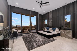 1313 Tortolita Mountain Circle Tucson, AZ 85755 - Photo 24 of 46 a living room with furniture and a large window