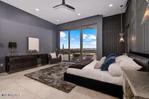 a dining room with furniture and a potted plant