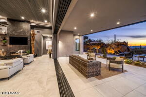 1313 Tortolita Mountain Circle Tucson, AZ 85755 - Photo 40 of 46 a living room with furniture and a flat screen tv