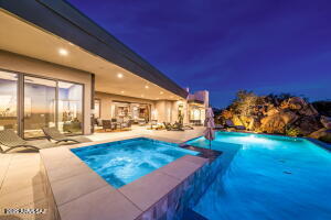 1313 Tortolita Mountain Circle Tucson, AZ 85755 - Photo 45 of 46 a swimming pool with yard