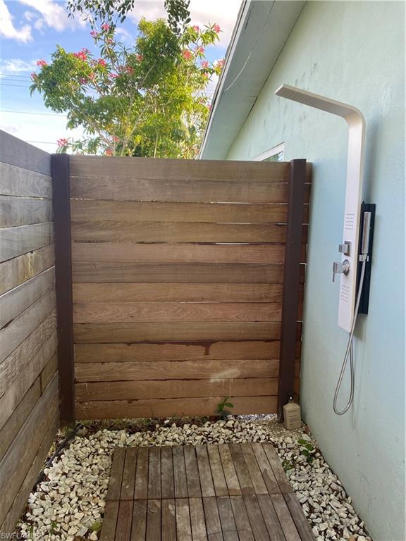 778 5th Avenue North Naples, FL 34102 - Photo 12 of 23 a bathroom with a shower