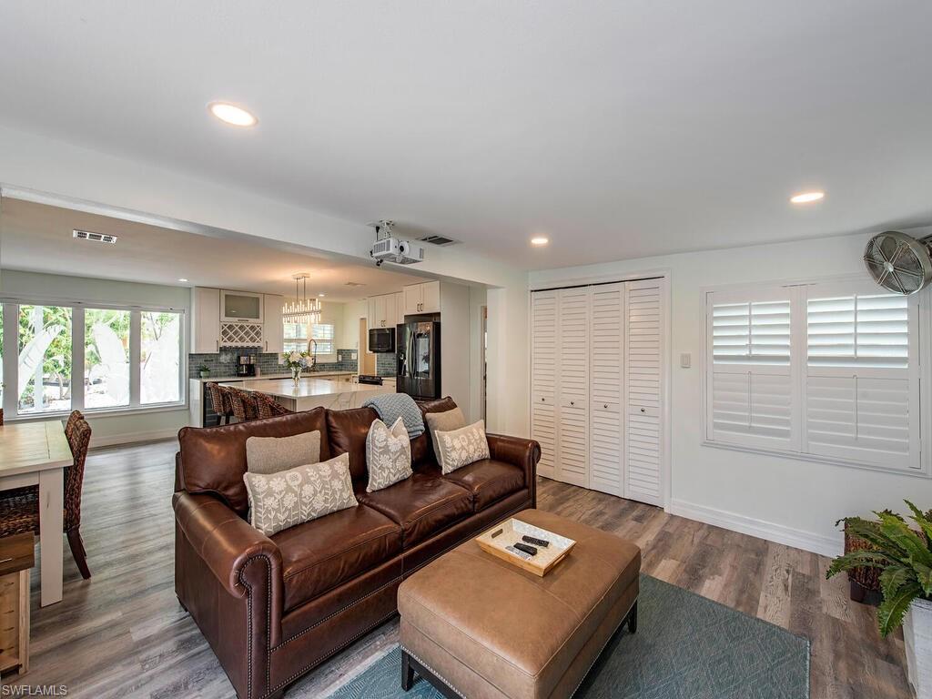 778 5th Avenue North Naples, FL 34102 - Photo 16 of 23 a living room with furniture and a window