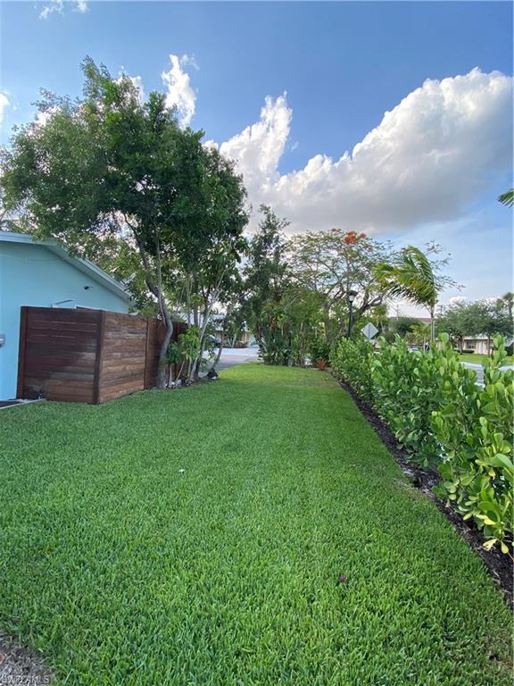 778 5th Avenue North Naples, FL 34102 - Photo 8 of 23 a view of a backyard with a garden