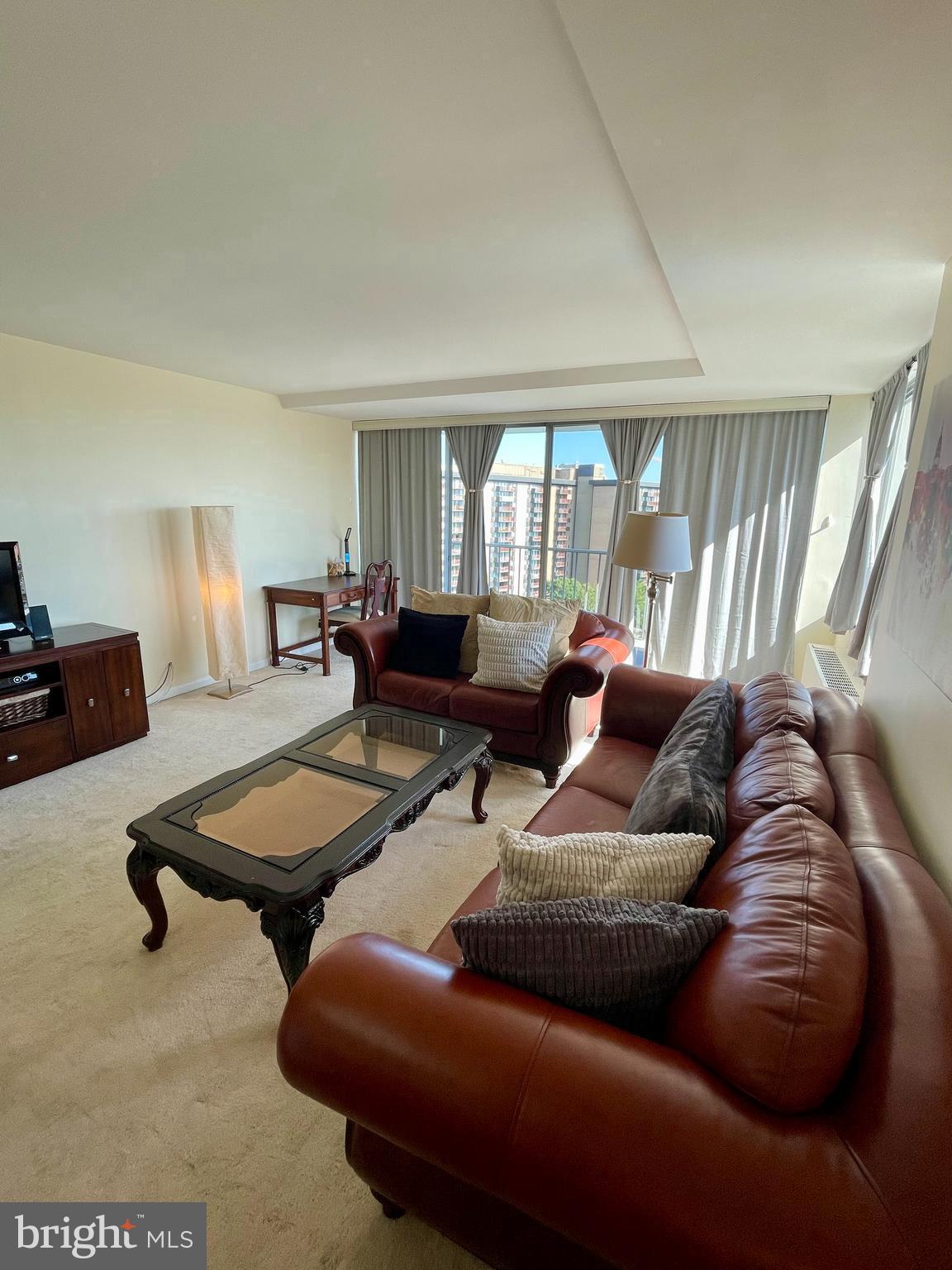 301 North Beauregard Street, Unit 1201 Alexandria, VA 22312 - Photo 5 of 7 a living room with furniture and a large window
