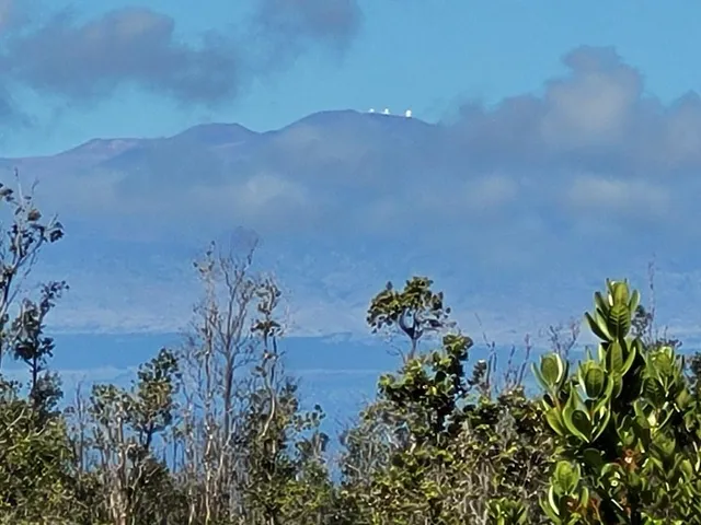 a view of a lake with a mountain in the background