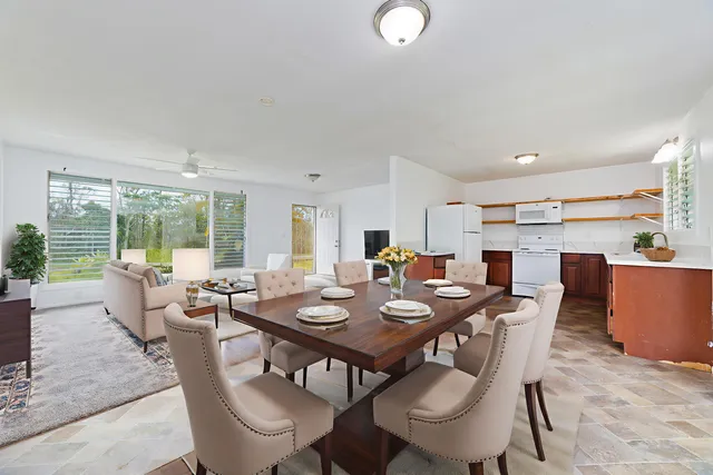 a view of a dining room with furniture