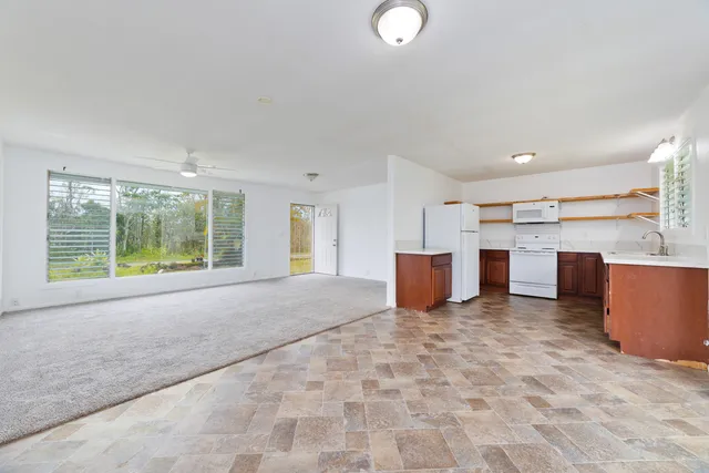 a view of a kitchen with a sink