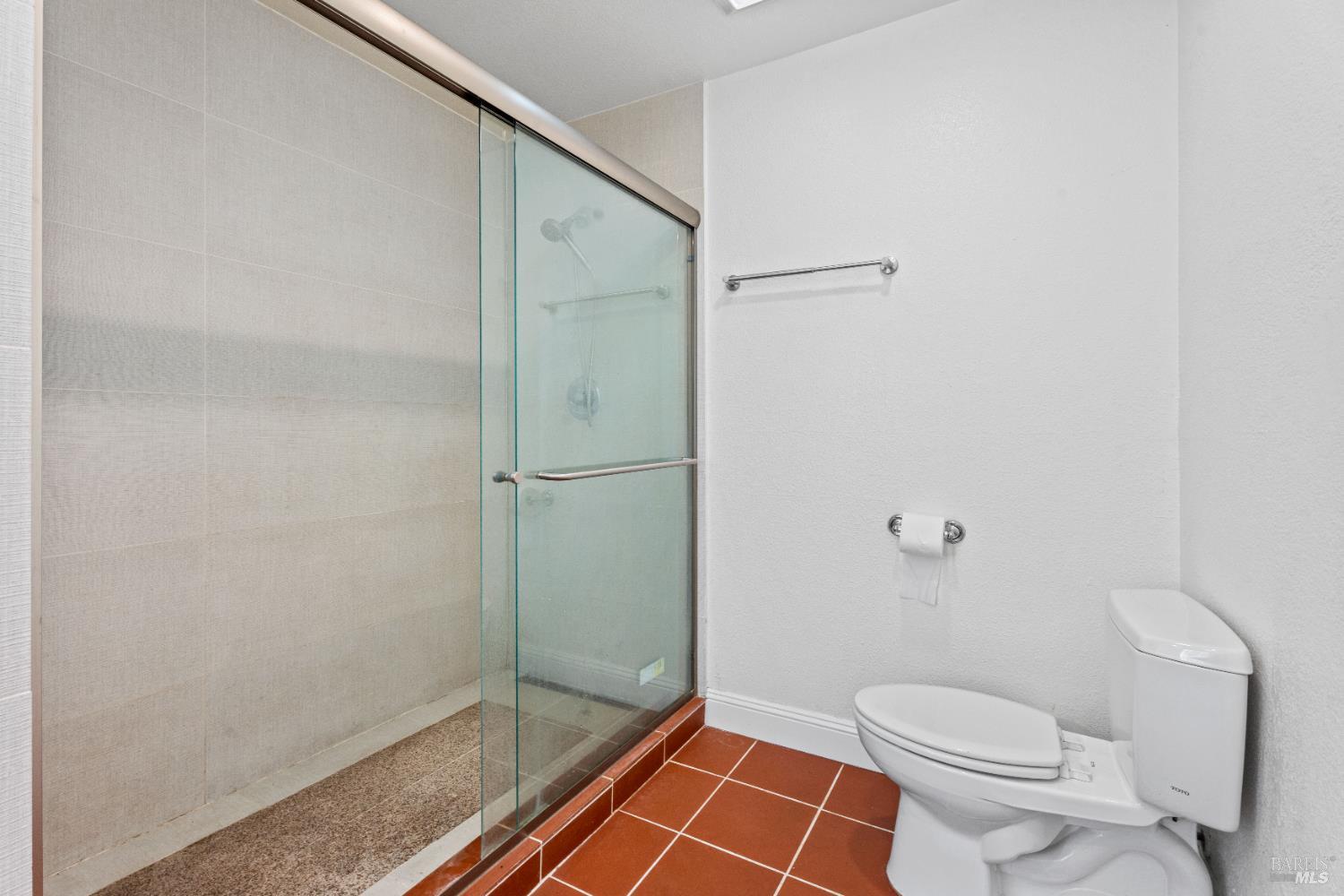 1701 Hickory Court Ukiah, CA 95482 - Photo 14 of 31 a bathroom with a toilet and a shower