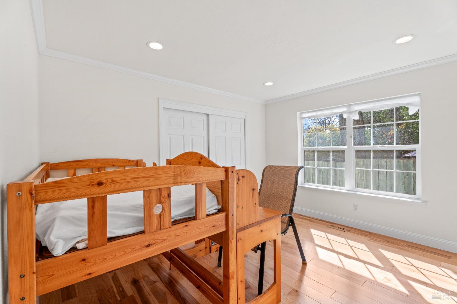 1701 Hickory Court Ukiah, CA 95482 - Photo 15 of 31 a blue bed sitting in a room next to a window
