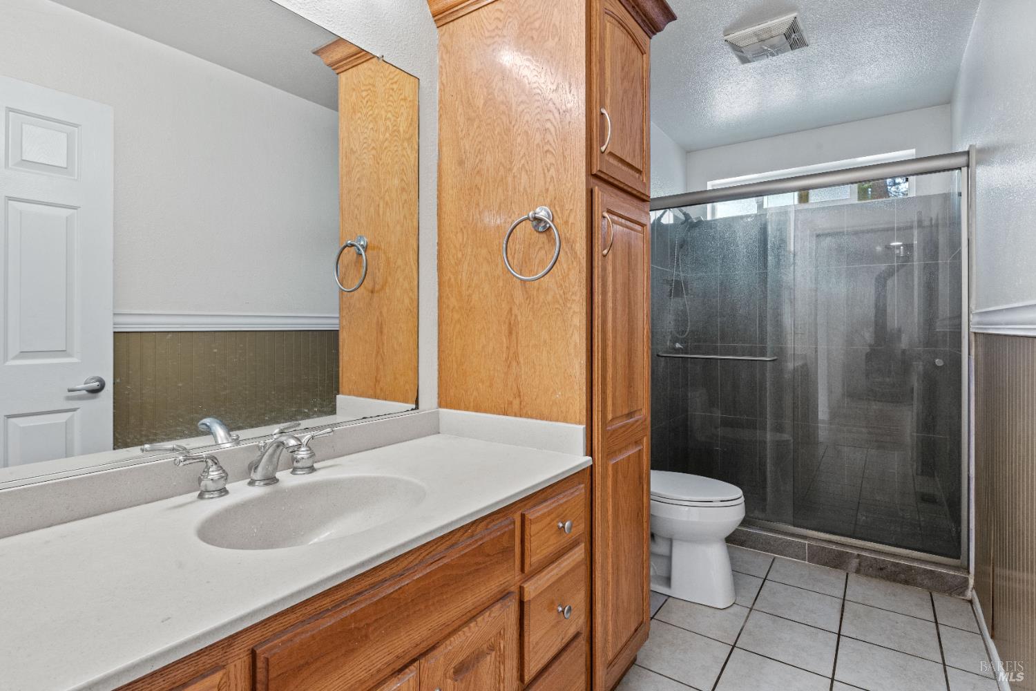 1701 Hickory Court Ukiah, CA 95482 - Photo 23 of 31 a bathroom with a sink a toilet and shower