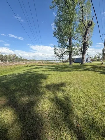 a view of an ocean from a yard