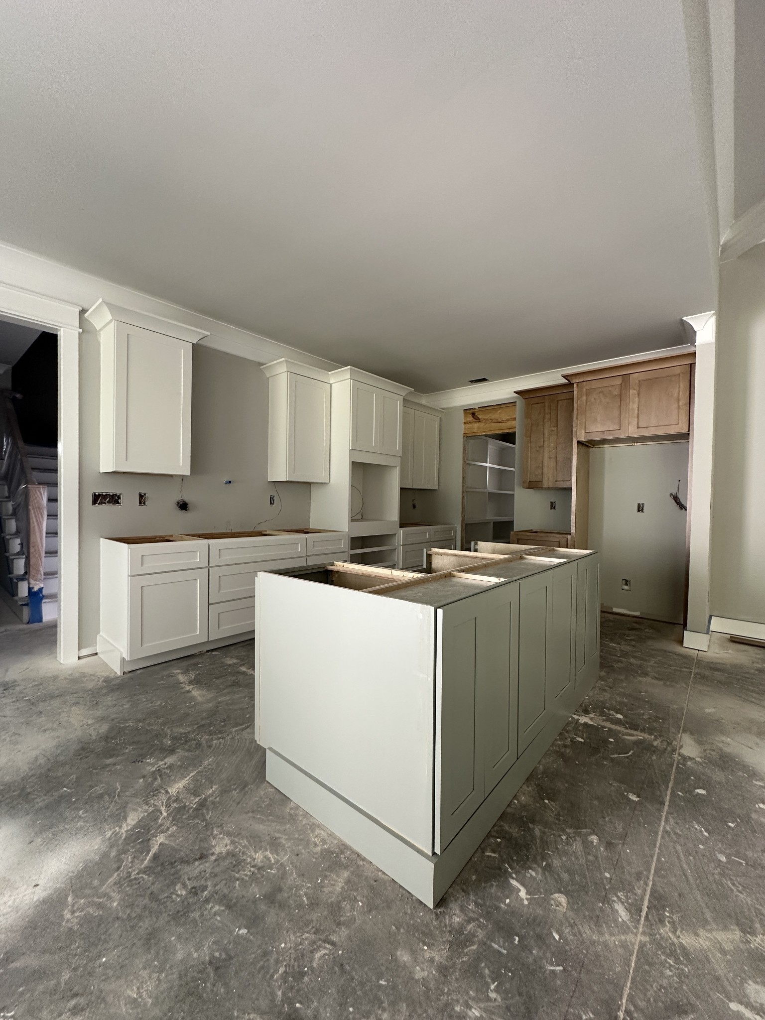 933 Ovoca Lake Road Tullahoma, TN 37388 - Photo 11 of 34 a kitchen with white cabinets and white appliances